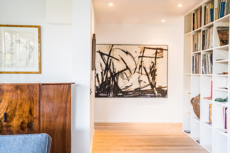 Berkhamsted HP4 - built in shelving with large artwork on adjacent wall - other uk houses - shootfactory location