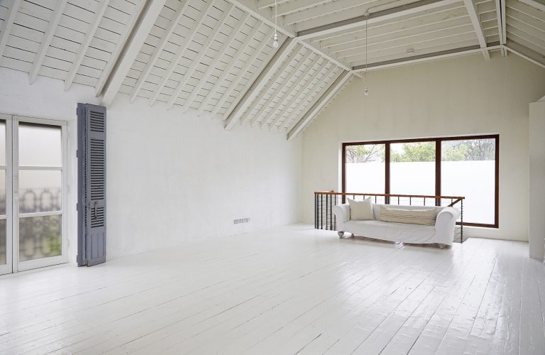A white studio space with vaulted ceiling and wooden flooring /TAVISTOCK LONDON, N19 - Updated Location House With Studio Space- SHOOTFACTORY