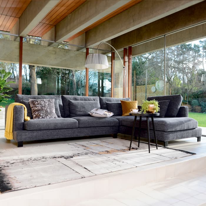 Dwell interiors lifestyle shoot featuring the Lugano right hand corner sofa charcoal - Shootfactory