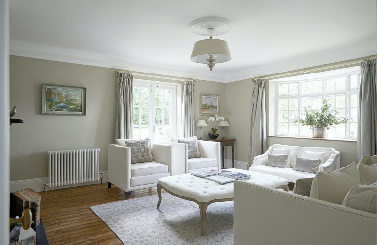 Wisteria House reception one with white sofas