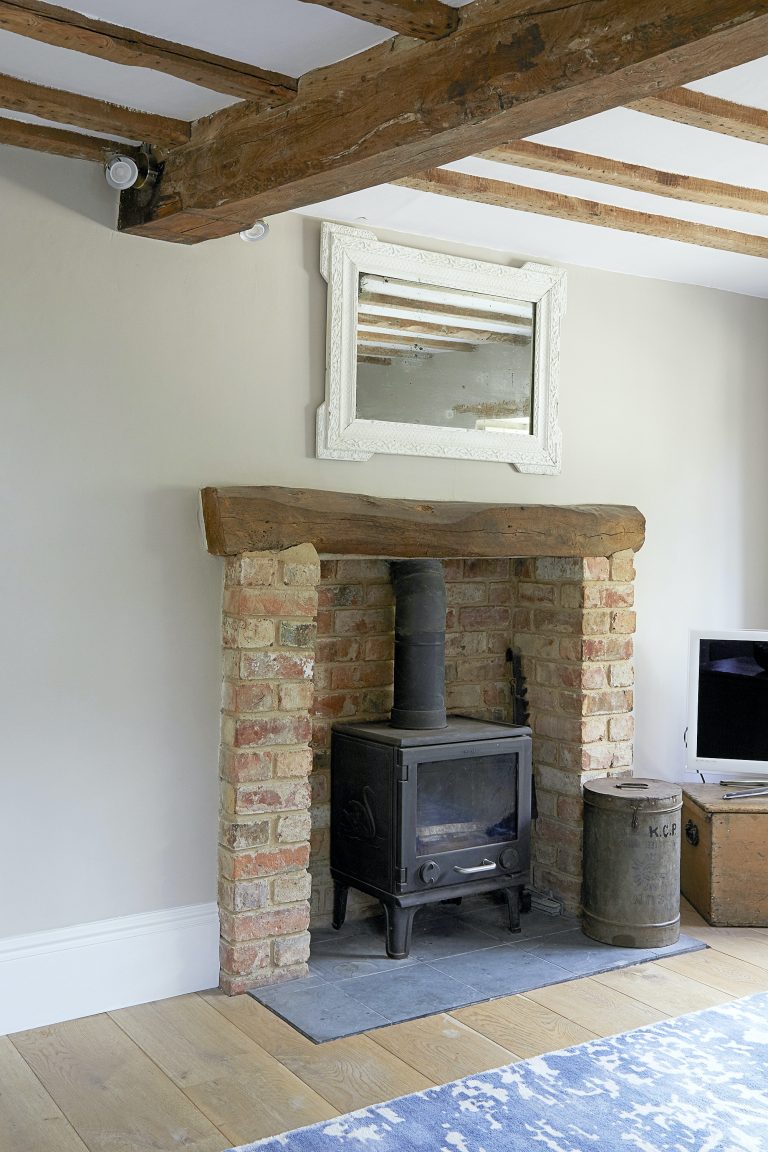 Wisteria House reception two with log burner fireplace