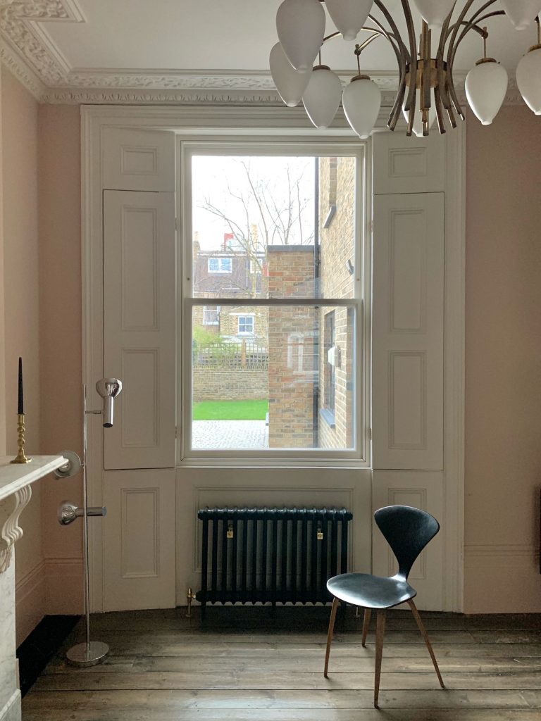Sash window/black radiator and modern dinning chair/BROOKE LONDON E5/Shootfactory/London location house