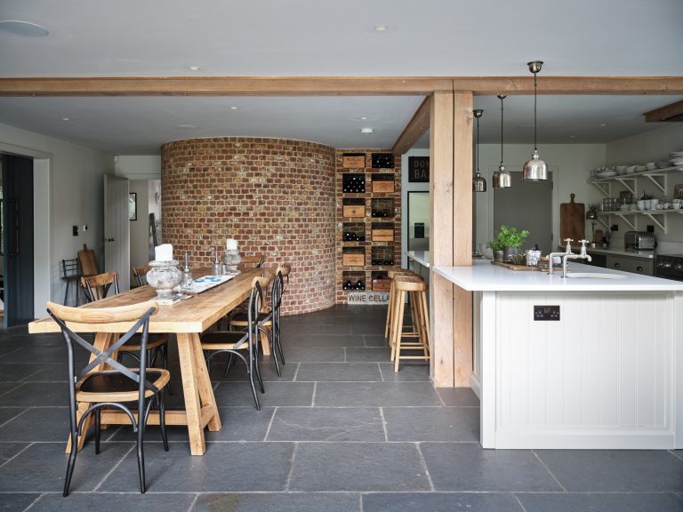 EXPOSED BRICK WALL IN KITCHEN DINING AREA - HAGUE BARN HENLEY ON THAMES, RG9 - SHOOTFACTORY - OTHER UK LOCATION HOUSE