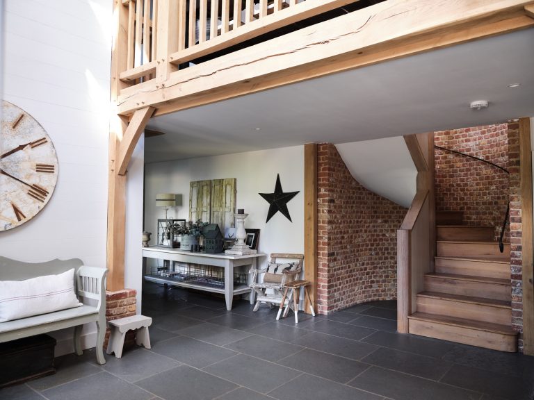 ENTRANCE HALL WITH EXPOSED BRICK WALL AND STAIRCASE - HAGUE BARN HENLEY ON THAMES, RG9 - SHOOTFACTORY - OTHER UK LOCATION HOUSE