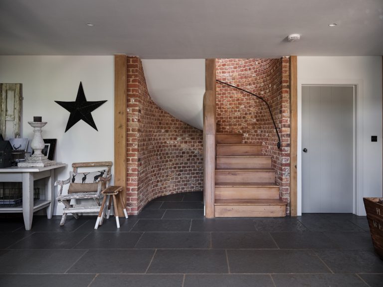 STAIRCASE LEADING UP TO HE FIRST FLOOR WITH EXPOSED BRICK WALL - HAGUE BARN HENLEY ON THAMES, RG9 - SHOOTFACTORY - OTHER UK LOCATION HOUSE