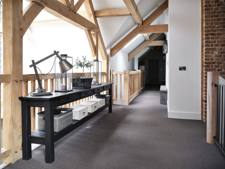 GALLERY LANDING AREA WITH CONSOLE TABLE AND RUSTIC HOME ACCESSORISES - HAGUE BARN HENLEY ON THAMES, RG9 - SHOOTFACTORY - OTHER UK LOCATION HOUSE