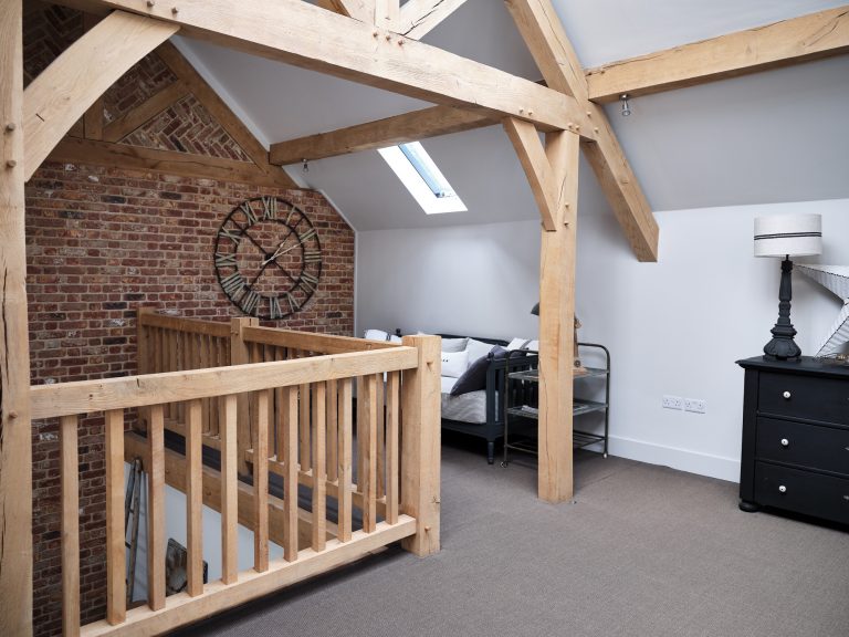 EXPOSED BARICK WALL AND OAK FRAMED GALLERY LANDING AREA - HAGUE BARN HENLEY ON THAMES, RG9 - SHOOTFACTORY - OTHER UK LOCATION HOUSE