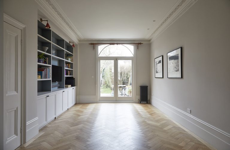 Room with parquet flooring and French doors that open to garden - Melrose SW18 - Shootfactory - London Location House
