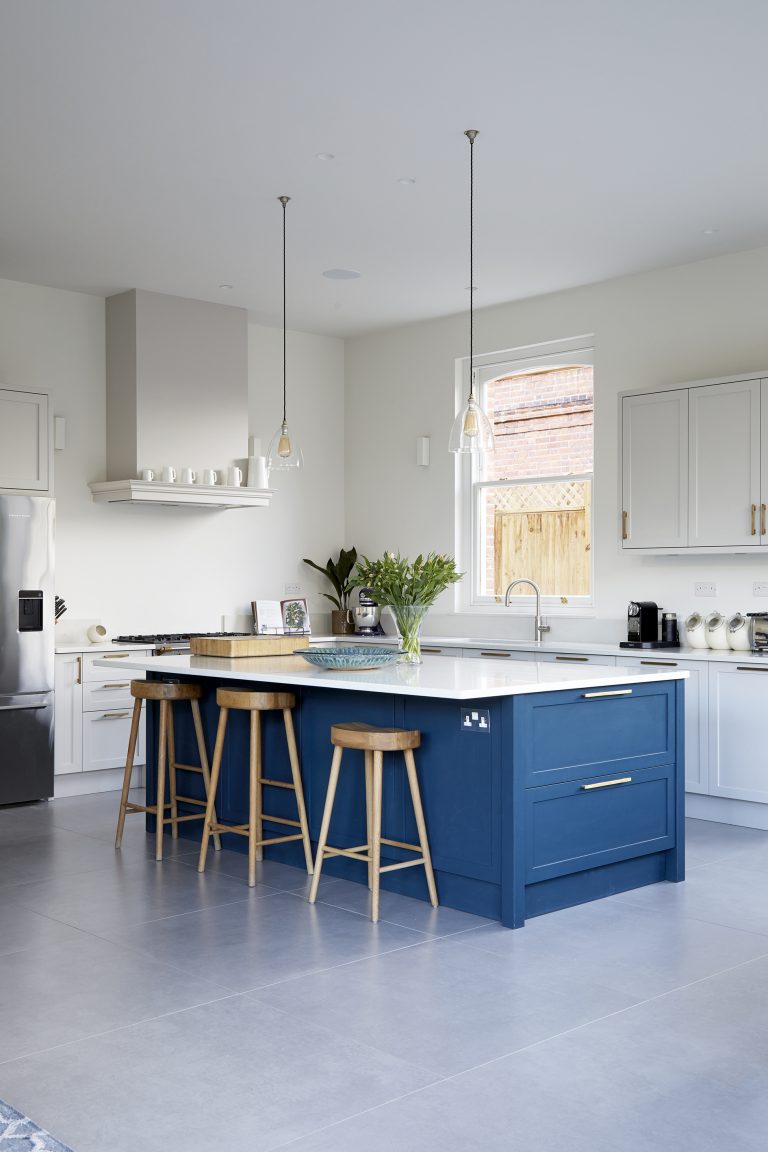 Large white kitchen with blue kitchen island - Melrose SW18 - Shootfactory - London Location House