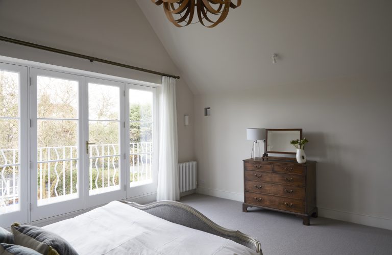 Bedroom with French doors that open onto balcony - Melrose SW18 - Shootfactory - London Location House