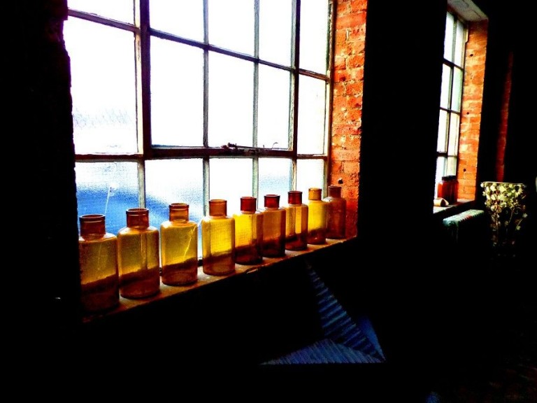 Yellow bottles and red brick sill / Blackheath, London, Se13 / Shootfactory Location